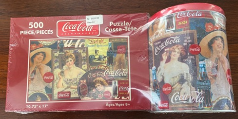 02557-1 € 25,00 coca cola puzzles set van 2 stuks 700 stuks en 500 stuks.jpeg